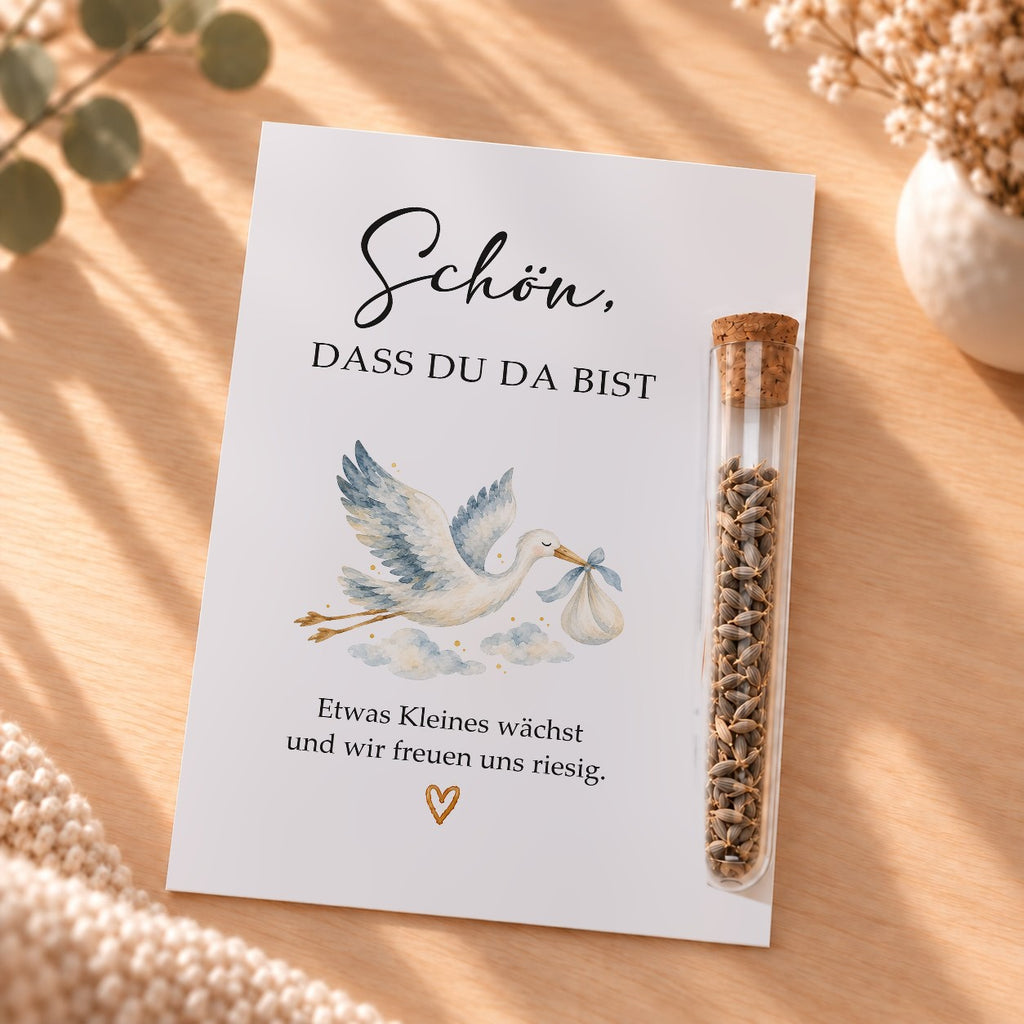 Gastgeschenk für die Babyparty mit Blumensamen: Karte mit Storch und Röhrchen