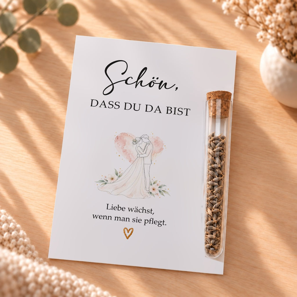 Gastgeschenk zur Hochzeit mit Blumensamen: Karte mit Brautpaar und Röhrchen