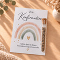Gastgeschenk zur Konfirmation mit Blumensamen: Karte mit Regenbogen in Aquarell mit Herz und Röhrchen