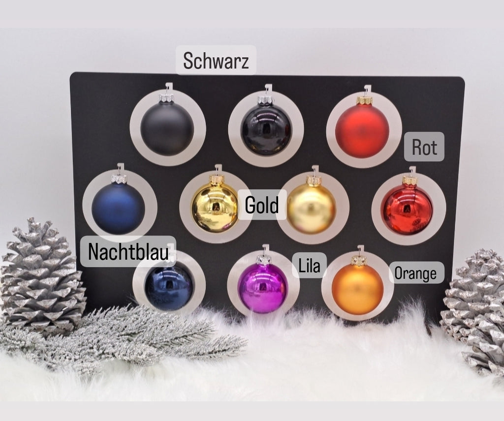 Farbübersicht für Weihnachtskugeln in Schwarz, Rot, Nachtblau, Gold, Lila und Orange
